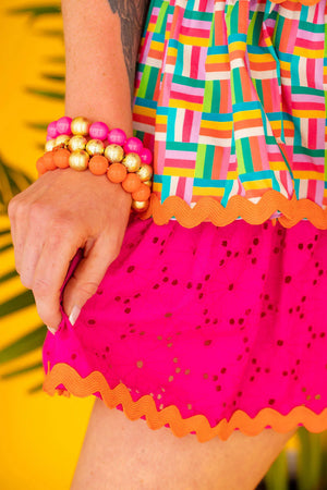 Rainbow Parquet and Pink Eyelet Ruffle Dress