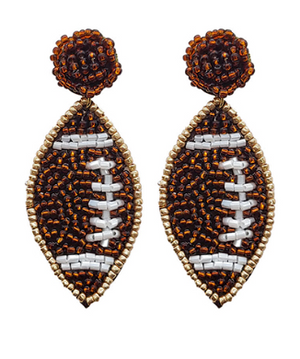 
            
                Load image into Gallery viewer, Beaded Football Earrings - Brown/White
            
        